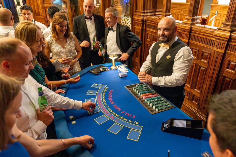 Guests smile at blackjack