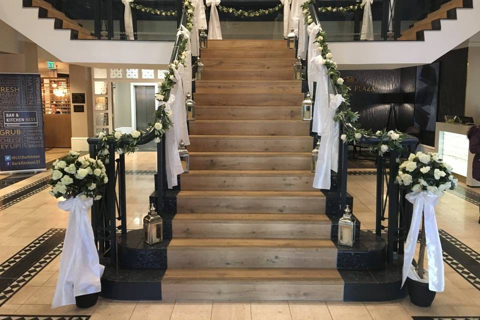 Decorated Staircase with Artificial Flowers and Organza Bows