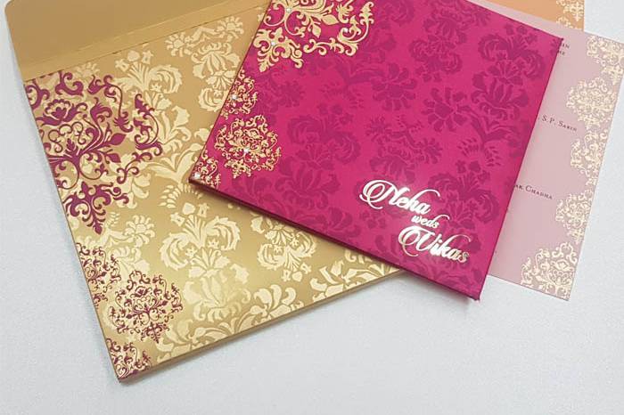 Gold and hot pink wedding invitation