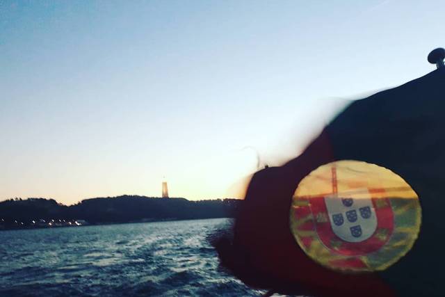 The Portuguese flag on river