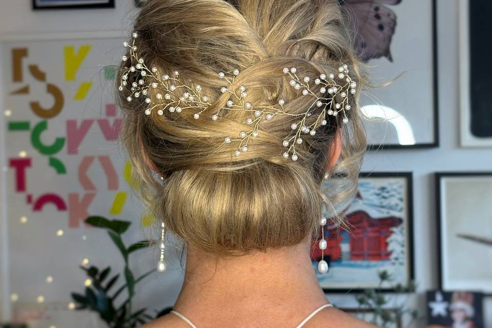 Soft romantic low bun