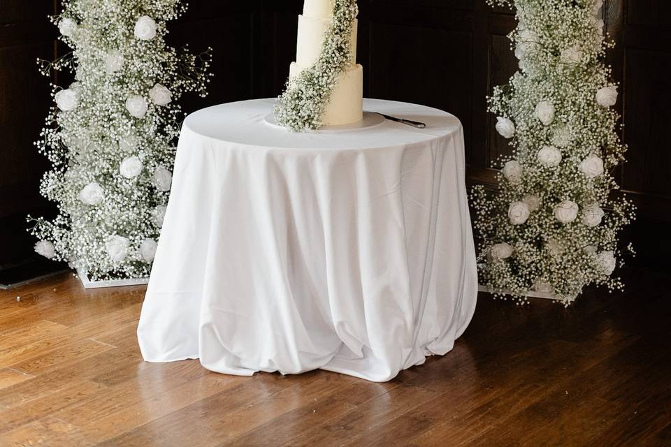 Cake stand and gypsophila arch