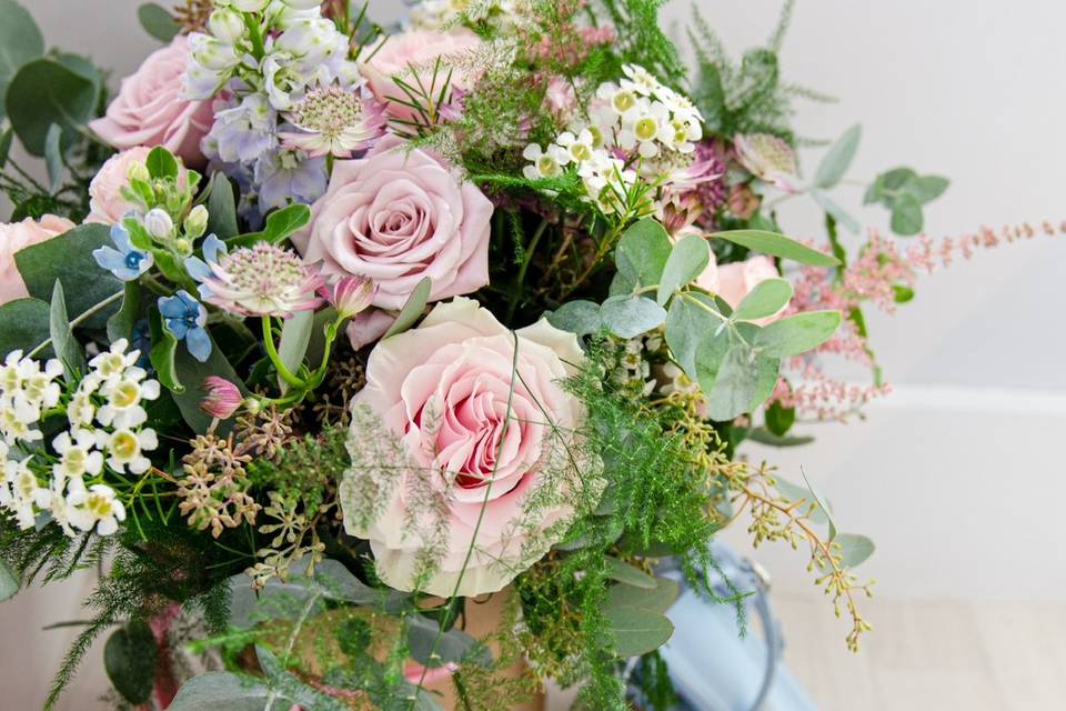 Soft pink, blue bridal bouquet