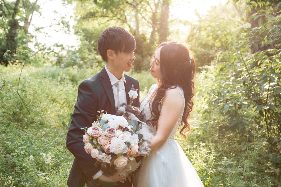 Bride and groom and dog