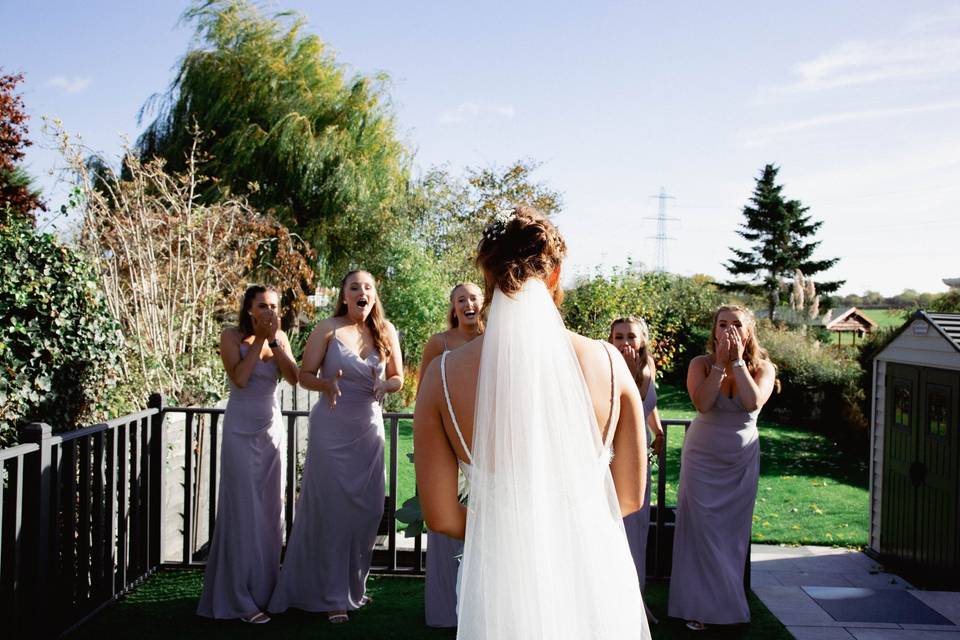 Brides maid seeing bride