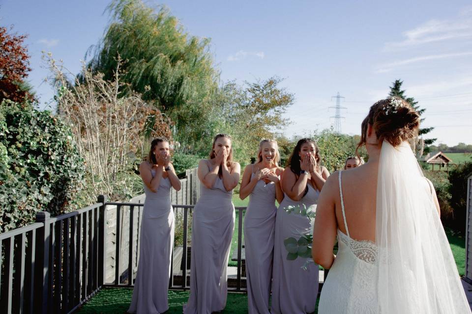 Brides maid seeing bride