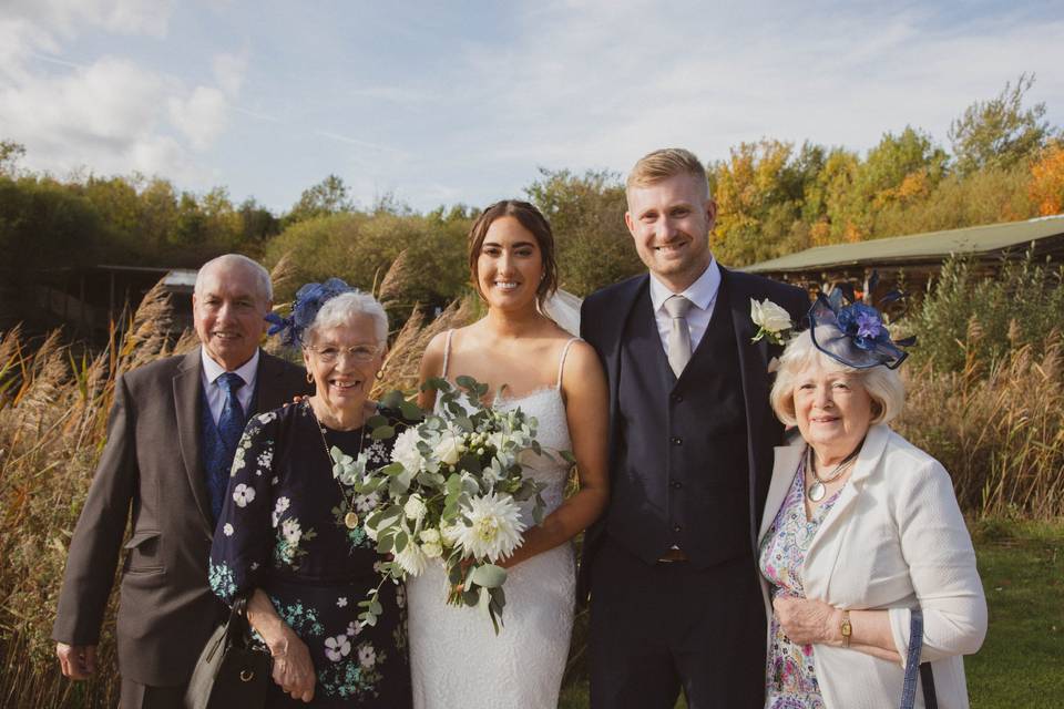 Bride and groom w grandparents