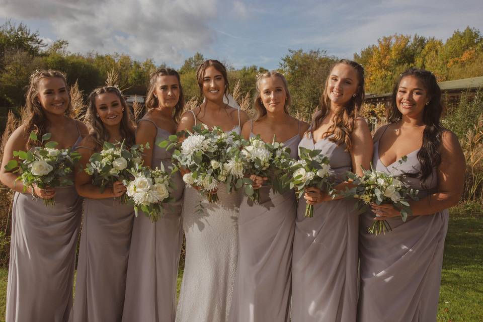 Bridesmaids and bride