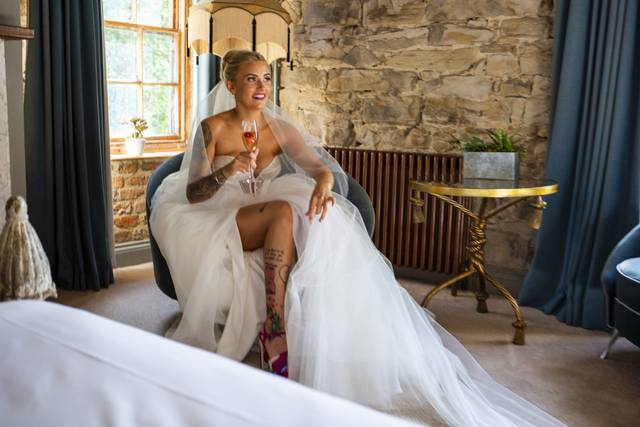 Quiet moments during the getting ready. Two photographers so nothing gets missed.