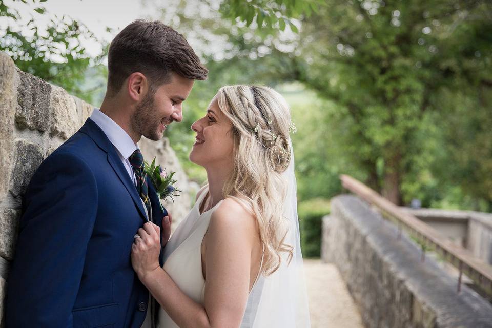 Bride and groom loving look