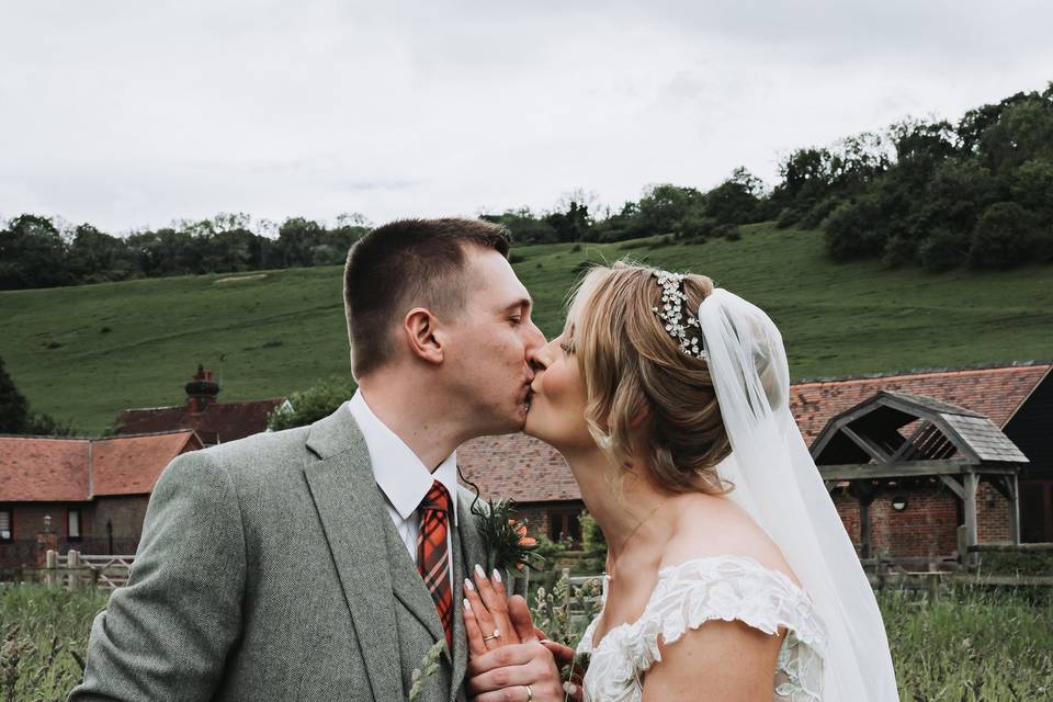 Bride and groom field portrait