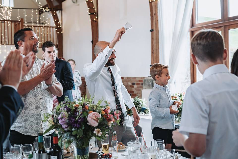 Wedding guests cheering