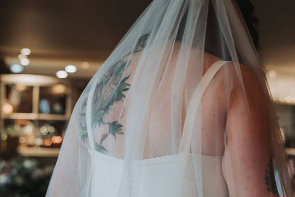 Tattooed bride wedding dress