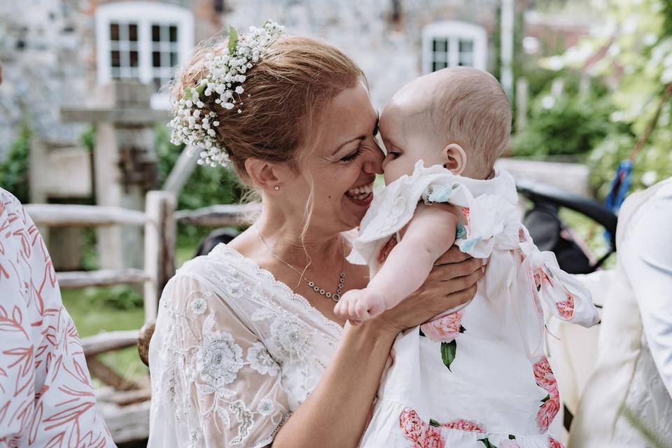 Bride with baby daughter