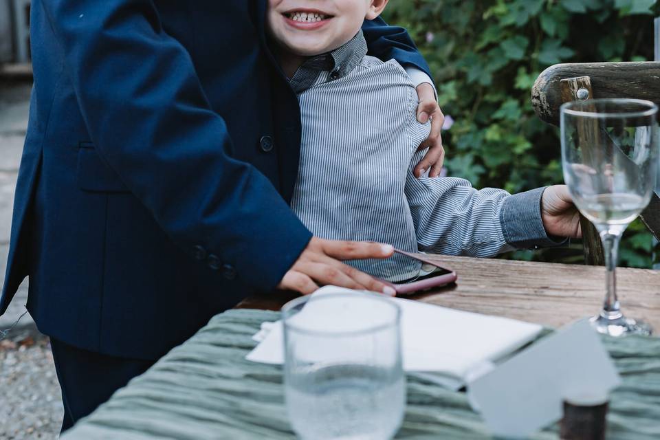 Children smiling at wedding