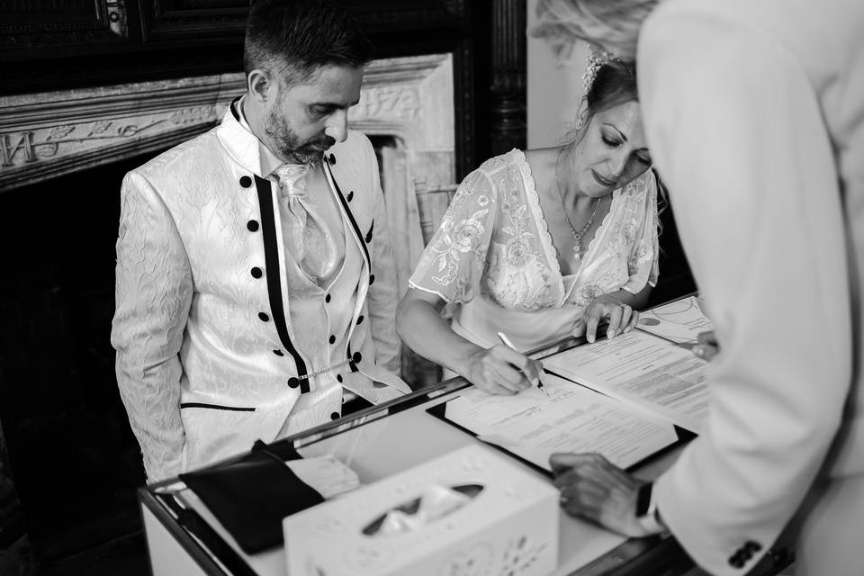 Bride & groom signing register