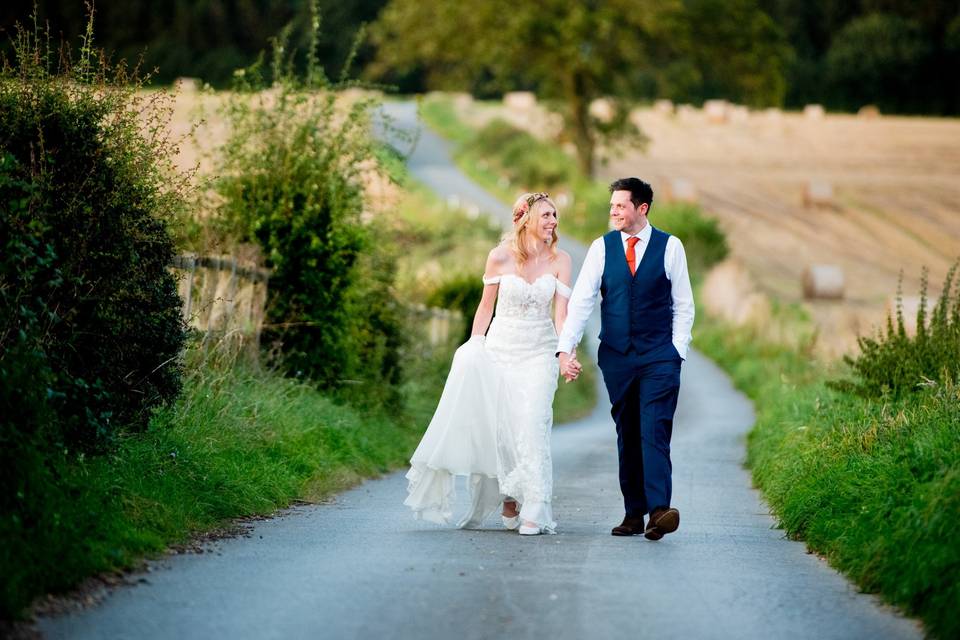 Couple walking together - Geoff Kirby Photography