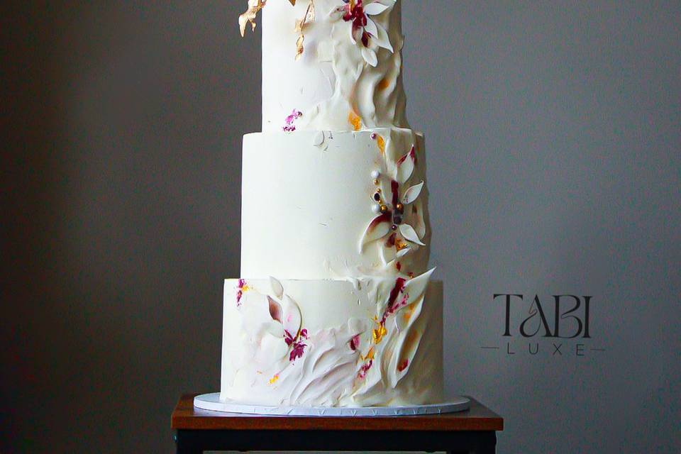 Gold and purple leaf wedding cake