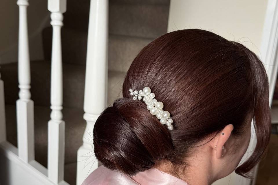 Sleek low bun