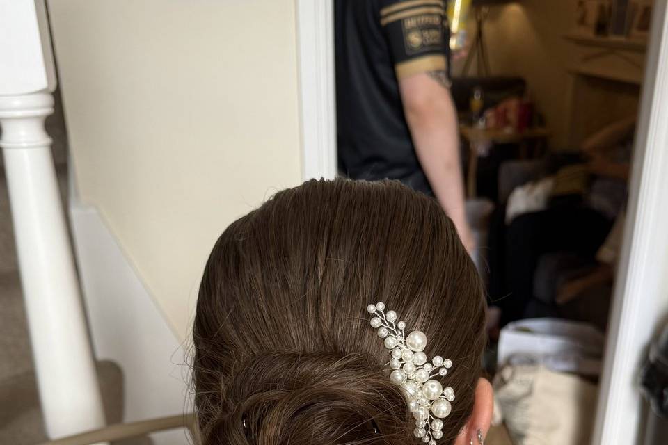 Sleek low bun