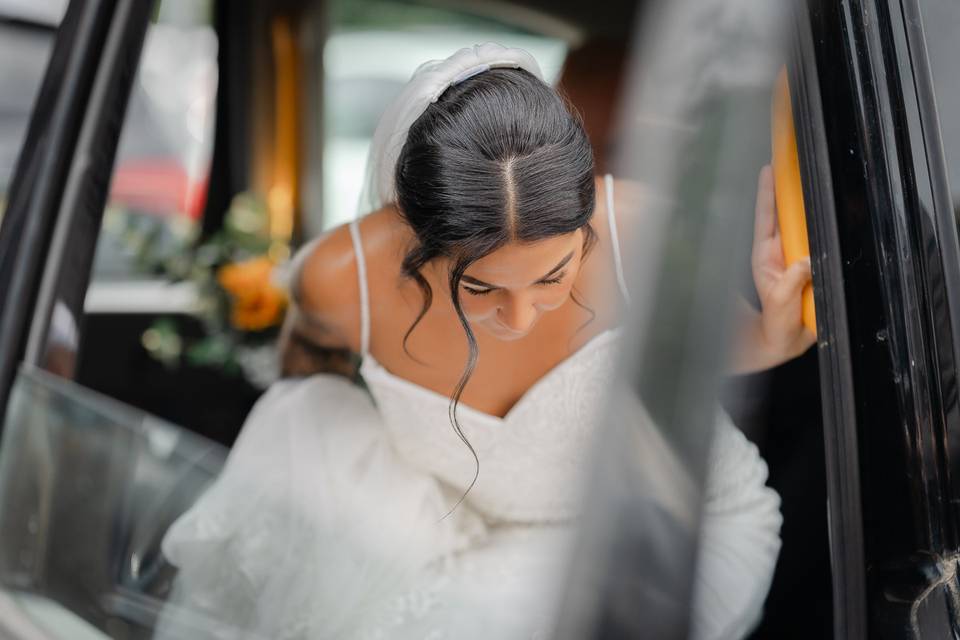 Bride getting out of car