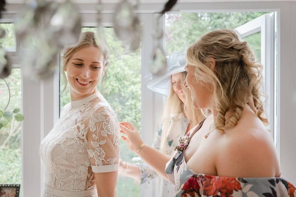 Bride getting dressed