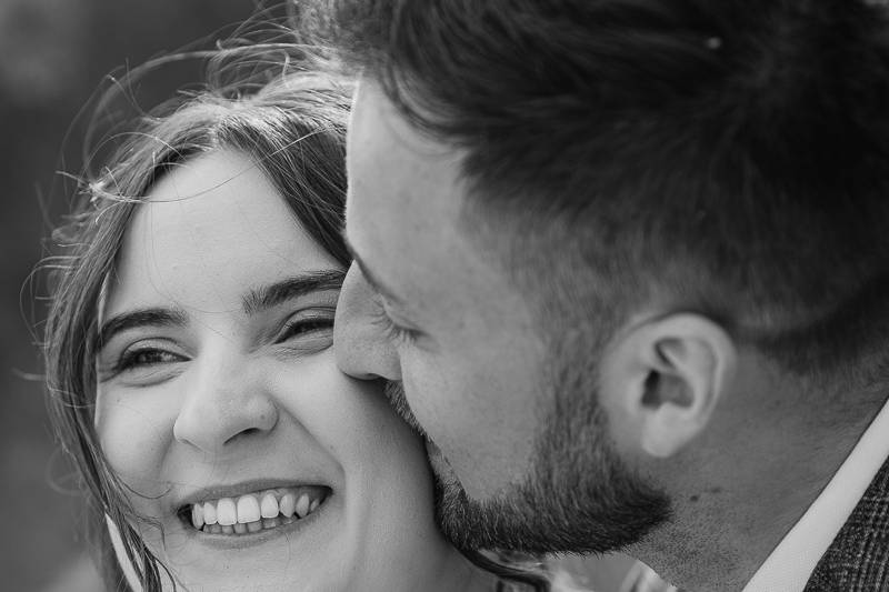 Groom kissing bride