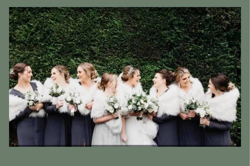 Bridesmaids and bride