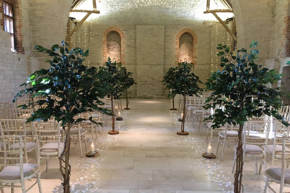 Tall bay trees at Tithe Barn