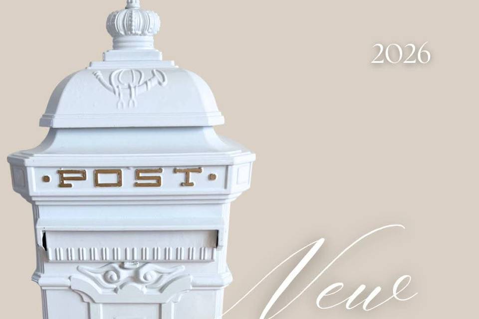 This elegant white post box of