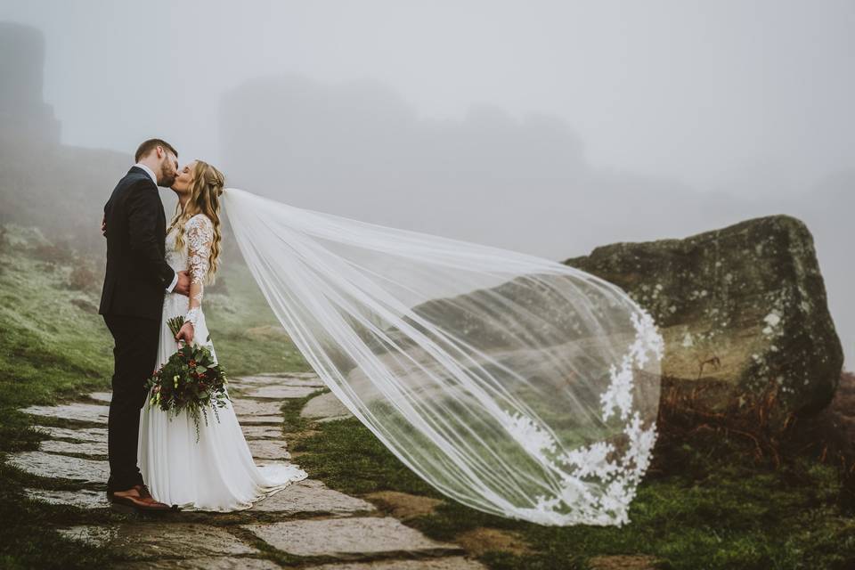 Bride and groom in mist