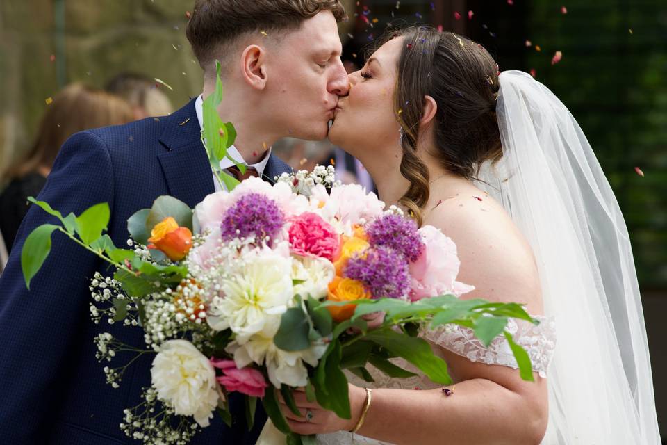 Kiss outside the church