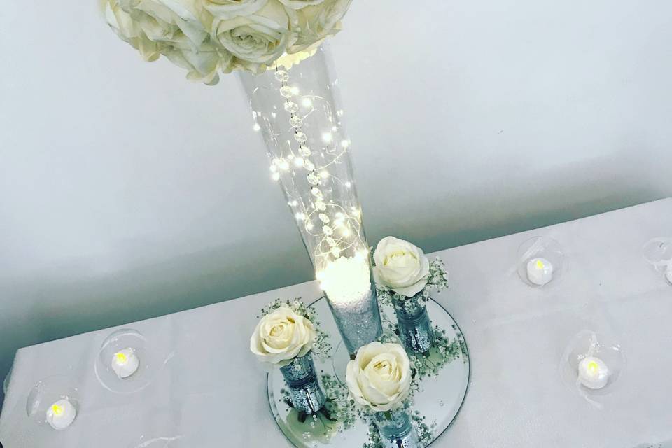 Tall rose centrepieces
