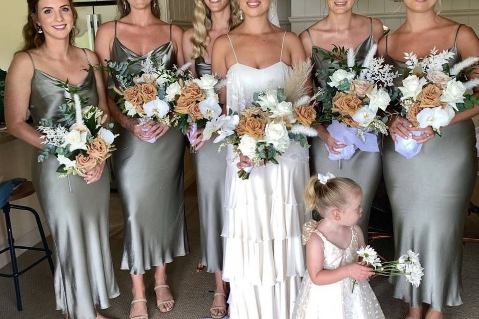 Wedding party holding bouquets