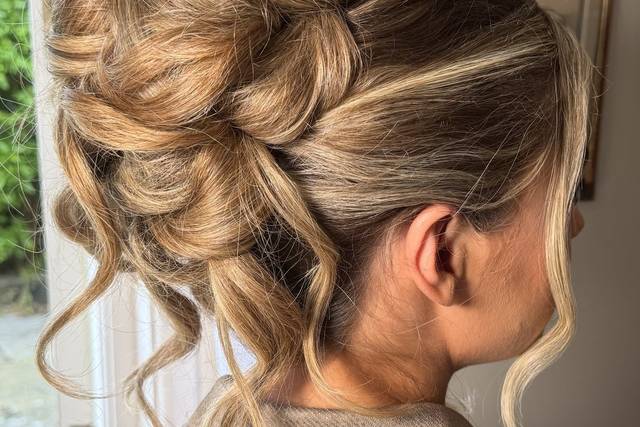Soft pammy bun up do