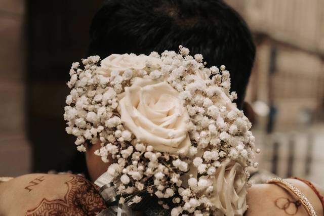 Bridal hands and bouquet