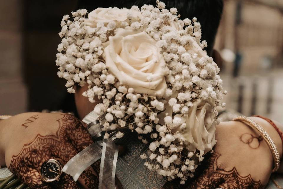 Bridal hands and bouquet