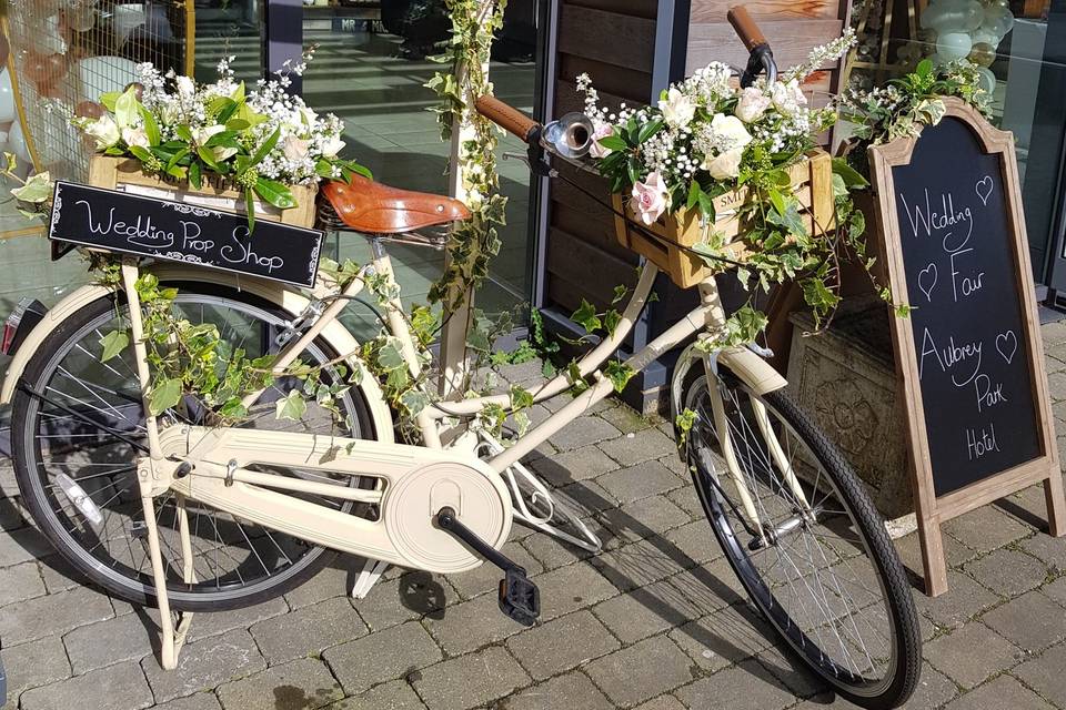 Floral bike with signs