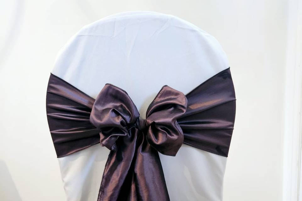 Aubergine bows and chair cover