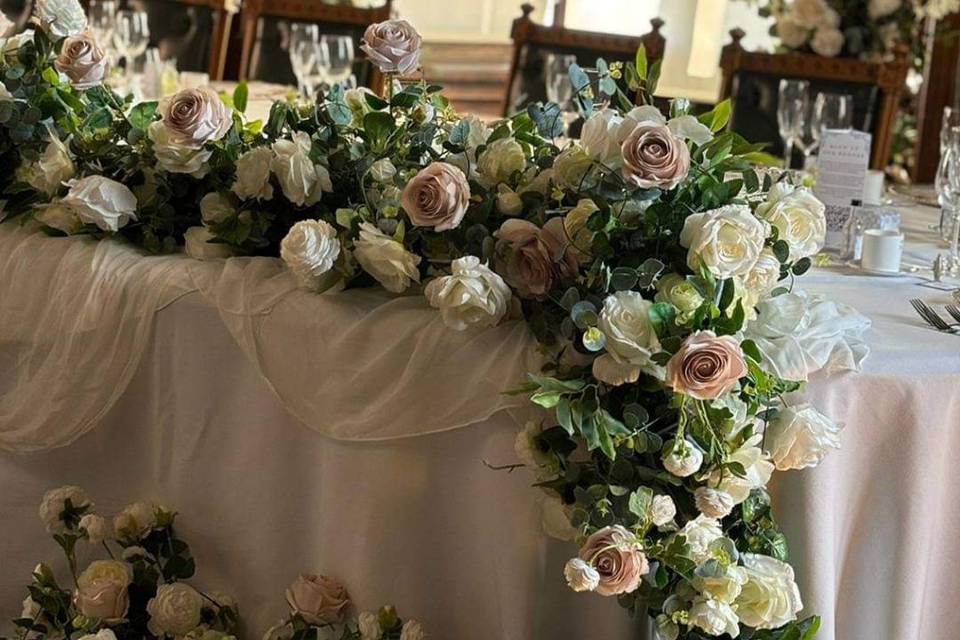 Top table cascading flowers