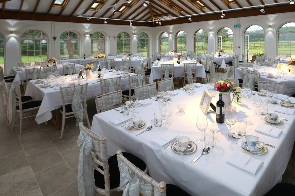 different table settings at Irnham for 2014 season