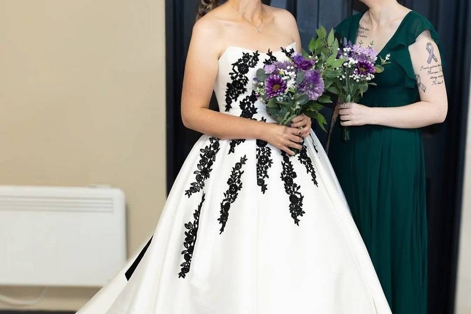Bride and bridesmaid.