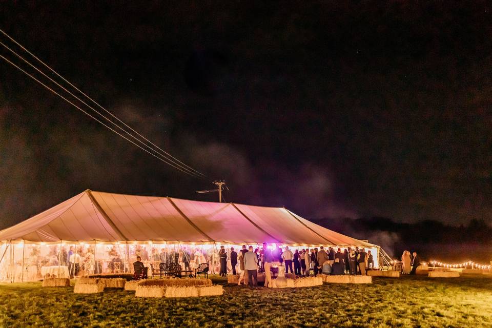 Pole tent at night