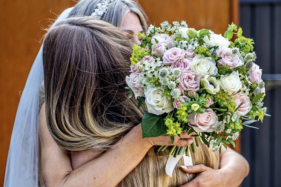 Sisters, Hugs and Flowers