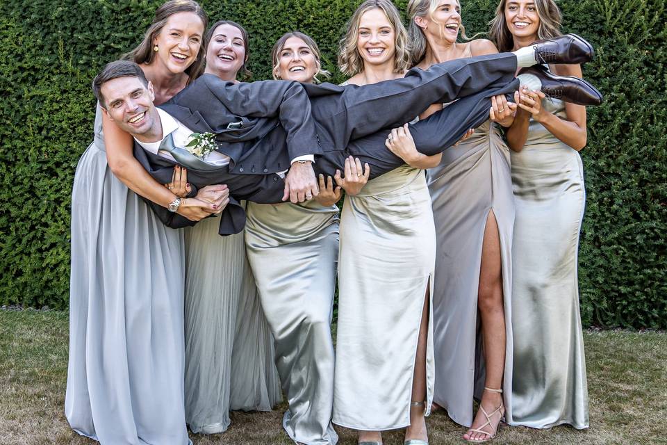 Bridesmaids and groom