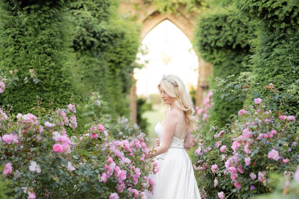 Bride walking the garden