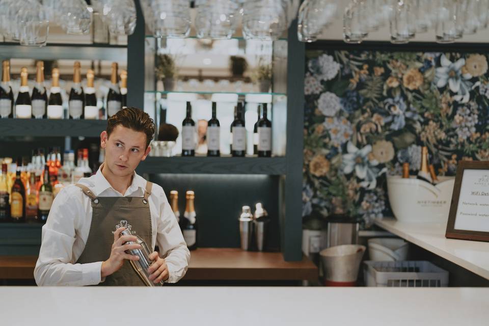 Bartender making cocktails