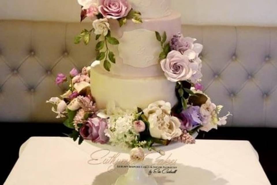 Lilac cake with sugar flowers