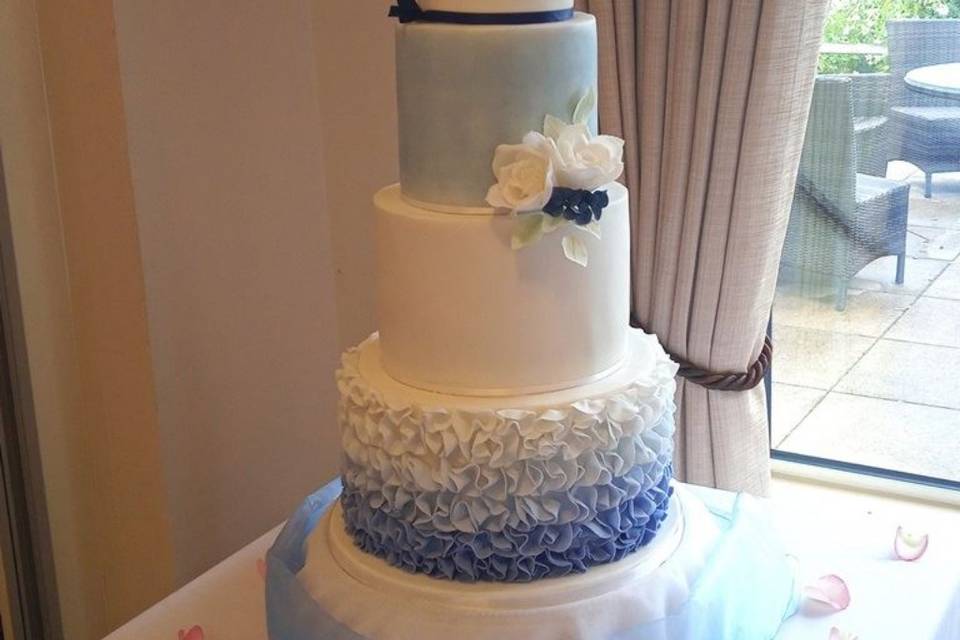 White and navy wedding cake