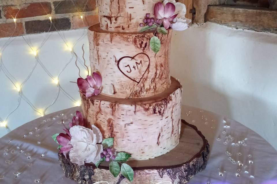 White cake with sugar flowers